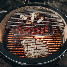 Close-up of a Monolith outdoor kitchen with dark gray fronts